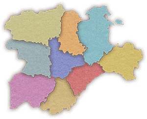 Sabores Artesanos: Marketplace de productos artesanales de Castilla y León en smartphone sobre el mapa de la región.